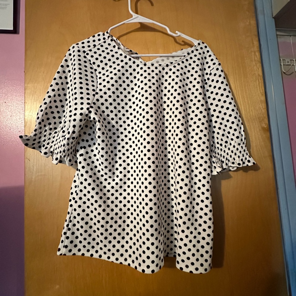 polka dotted blouse